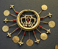 Room 12 – A gold earring from the Aegina Treasure, Greece, 1700–1500 BC