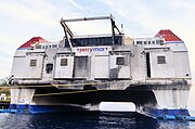 Laid up in Curaçao. The dirt on the back is soot from the diesel generators.