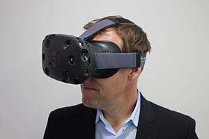 HTC's former executive director of marketing Jeff Gattis wearing a Vive.