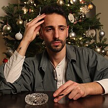 A man smoking a marijuana joint containing THC which can have a negative impact on semen quality