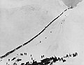 Image 4Miners and prospectors climb the Chilkoot Trail during the Klondike Gold Rush. (from History of Alaska)