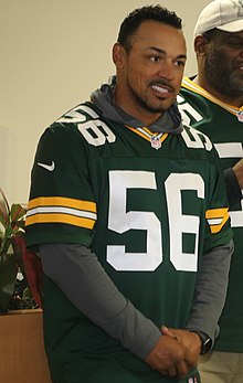 Barnett posing for a photo in his uniform