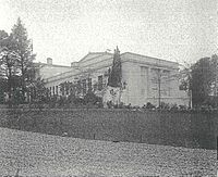 A white Neoclassical school building