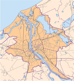 Mapa konturowa Rygi, w centrum znajduje się punkt z opisem „Ambasada Rzeczypospolitej Polskiej w Rydze”