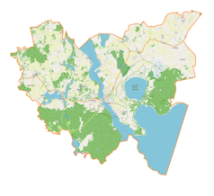 Mapa konturowa gminy Mikołajki, blisko centrum na dole znajduje się punkt z opisem „Śniardewno”