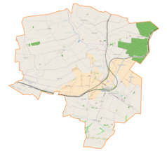 Mapa konturowa gminy Charsznica, u góry po prawej znajduje się punkt z opisem „Uniejów-Rędziny”