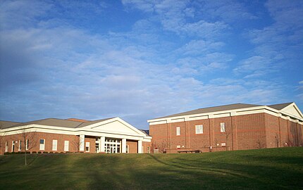 Front corner view showing gym (right) and music wing, 2006