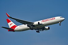 Quarter view of an Austrian Airlines 767, with red winglets