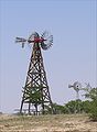 Double windmill and common Aeromotor windmill in Texas