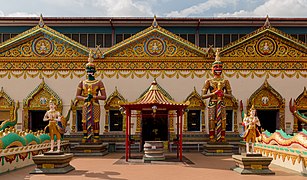 Statue of Devas and Yakshas guarding the temple.