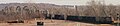 Coal train crossing the Union Pacific Bridge with the Loess Hills in background.