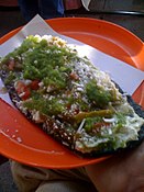 blue corn meal tlacoyo