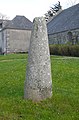 Une des deux stèles protohistoriques situées devant la chapelle Saint-Philibert.