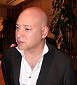 Evan Handler interpreta Charlie Runkle