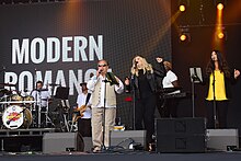 Andy Kyriacou of Modern Romance performing at Let's Rock Liverpool, 31 July 2021. Photograph by Andrew D. Hurley