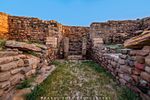 Archaeological site with some brick and stone walls