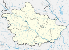 Mapa konturowa powiatu kazimierskiego, blisko centrum na lewo u góry znajduje się punkt z opisem „Wikle”