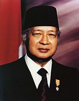 Peci, worn here by Suharto, then president of Indonesia