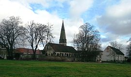 A view of the church from the Chateau park, in Jambville