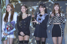 Blackpink smiling upon receiving an award