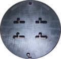 Front side of a four family die. The die is 228 mm (9.0 in) in diameter.