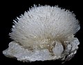 Image 15Natrolite is a mineral series in the zeolite group; this sample has a very prominent acicular crystal habit. (from Mineral)