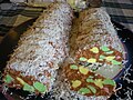 Sliced lolly cake, with a coconut coating