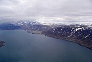 The town and airport snuggled in beside the mountains