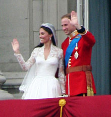 William in his military uniform with Catherine in a bridal gown