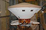 On Launch Pad 17-A at Cape Canaveral Air Force Station, the Phoenix Mars Lander waits for the fairing installation. Phoenix's sterilized heat shield is encapsulated in the white bio-shield to prevent an infection of Mars by Earthly bacteria. The bio shield as well as surface bacteria are incinerated during the descent.