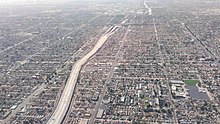 South-Los-Angeles-110-and-105-freeways-Aerial-view-from-north-August-2014.jpg