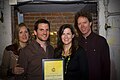 Nick and Helen Forster present the eChievement Award to environmentalist Lauren Sullivan (2nd from right) and her musician husband, Guster guitarist/vocalist Adam Gardner (2nd from left), of Reverb.