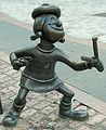 Image 71Statue of Minnie the Minx, a character from The Beano, in Dundee, Scotland. Launched in 1938, The Beano is known for its anarchic humour, with Dennis the Menace appearing on the cover. (from Culture of the United Kingdom)