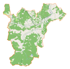 Mapa konturowa gminy Rajcza, u góry po lewej znajduje się punkt z opisem „Parafia Nawiedzenia Najświętszej Maryi Panny”