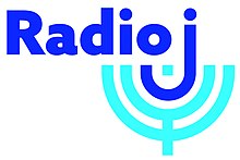 The logo for Radio J