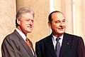 Clinton with Jacques Chirac outside Élysée Palace.