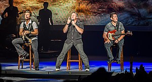 Rascal Flatts in 2013 (L–R: Rooney, LeVox, and DeMarcus)