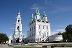 An orthodox church and a bell tower with green roof