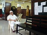 I-8. A Parsi priest at the Zoroastrian Fire temple on Metcalfe Street, Kolkota.