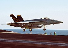 NK-200, the CAG Bird of VFA-115, launch from the USS Abraham Lincoln (CVN-72) on 9 October 2002.