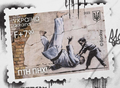 Známka inspirovaná graffiti, které Banksy nakreslil na jednu zničenou zeď v Boroďance - chlapec porážející Putina v judu