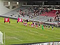 Einmarsch der Mannschaften am 31. Juli 2015 zum ersten Spieltag der Ligue 2 2015/16 mit dem Spiel Olympique Nîmes gegen den FC Évian Thonon Gaillard