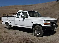 Ford F-250 extended cab fitted with an aftermarket utility bed