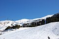 „Lavlja Vrata“ double seater chairlift, near the base station, and the „Bačila“ T-br ski lift with the „Bačila“ ski slope.