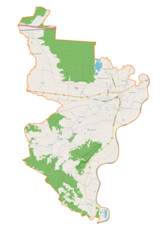 Mapa konturowa gminy Wojnicz, blisko centrum na prawo u góry znajduje się punkt z opisem „Dębina Zakrzowska”