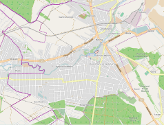 Mapa konturowa Konstancina-Jeziorny, blisko centrum po prawej na dole znajduje się punkt z opisem „Budynek Zespołu Szkół nr 2 w Konstancinie-Jeziornie”