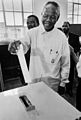 Image 36Nelson Mandela voting in 1994, after thirty years of imprisonment. (from 1990s)