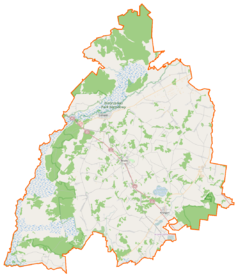 Mapa konturowa powiatu monieckiego, w centrum znajduje się punkt z opisem „Mierkienniki”