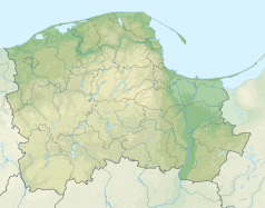 Mapa konturowa województwa pomorskiego, na dole znajduje się owalna plamka nieco zaostrzona i wystająca na lewo w swoim dolnym rogu z opisem „Lubichowskie Jezioro”