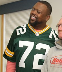 Earl Dotson in his jersey smiling